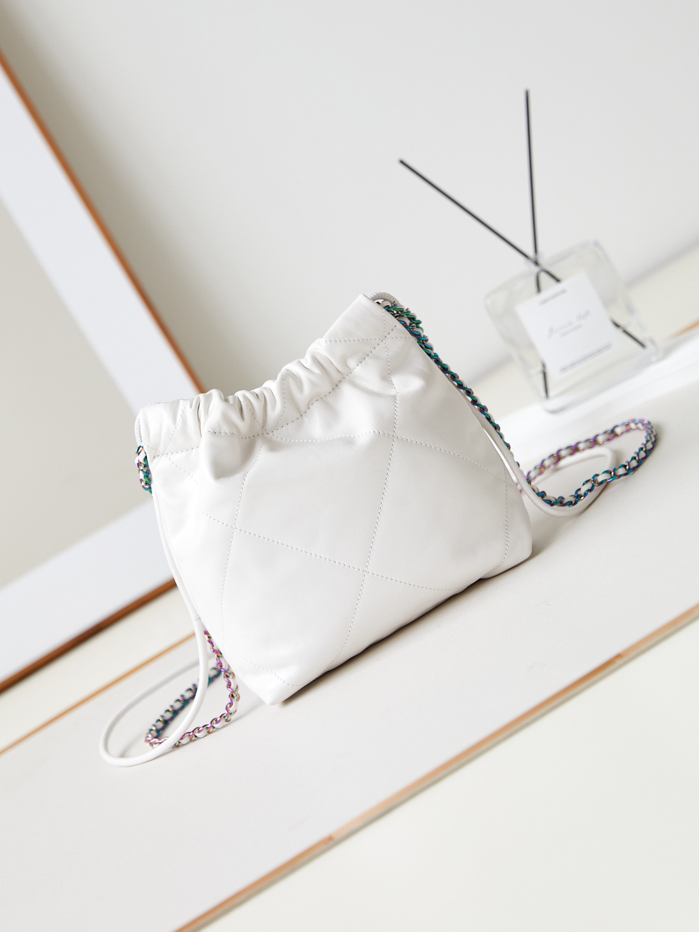 Ch*el 22 mini handbag shiny calfskin & rainbow metal white 7.8 × 7.4 × 2.3 in