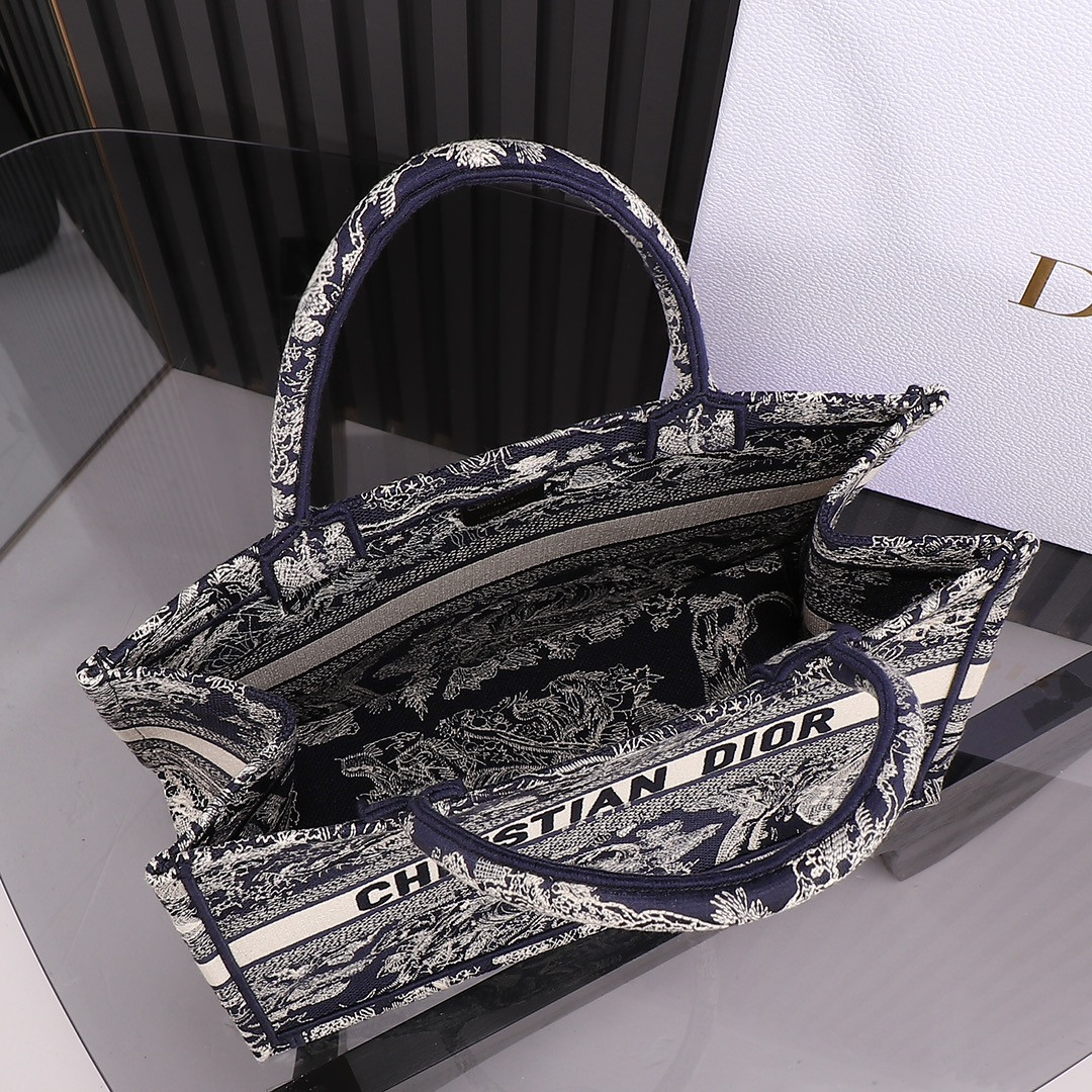 medium D*or book tote blue and ecru toile de jouy reverse embroidery 14 x 11 x 6.5 inches