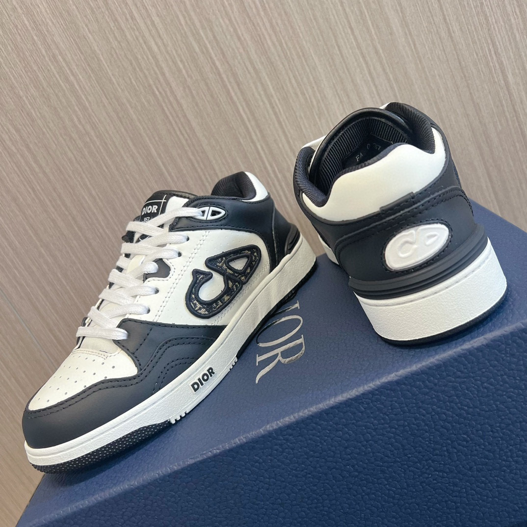 ua D*or b57 low-top sneaker black and white