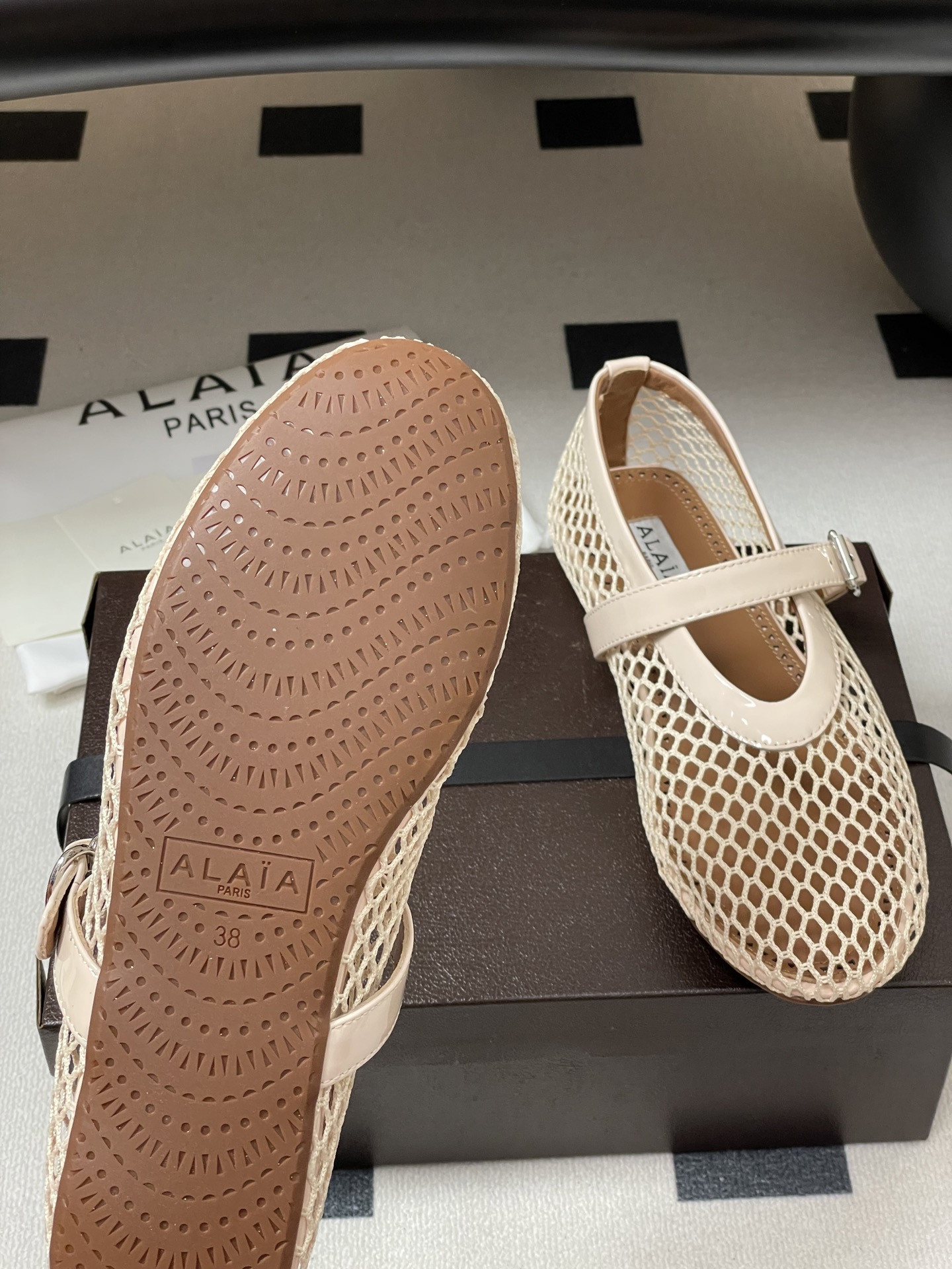 UA ALAÏA BALLET FLATS IN FISHNET